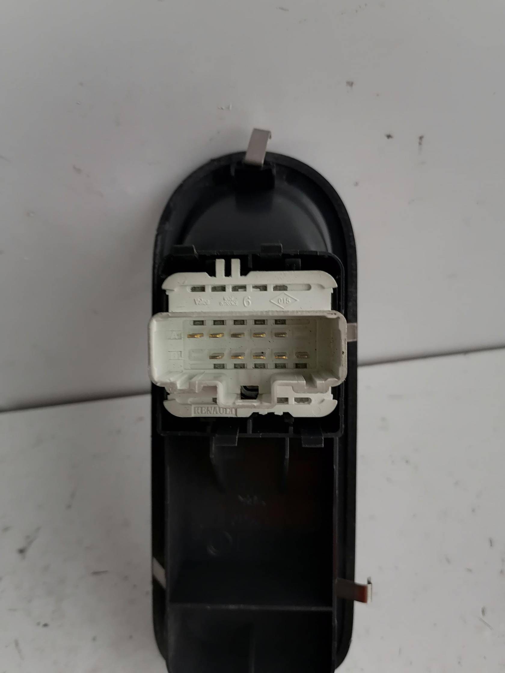 Interruttore alzacristalli porta ant. sx.